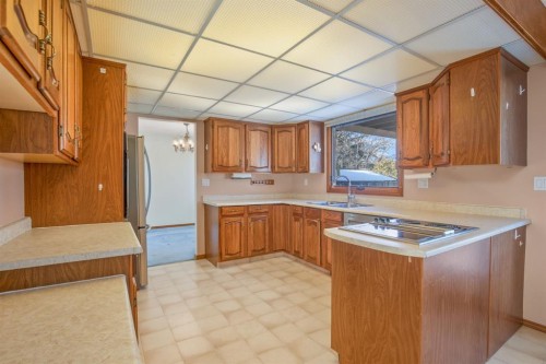 36 Muldrew Crescent, Red Deer, AB - Indoor Photo Showing Kitchen With Double Sink