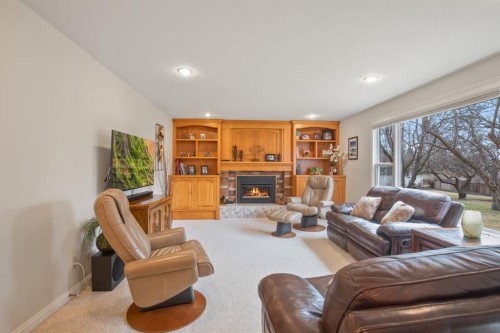 3510 43A Avenue, Red Deer, AB - Indoor Photo Showing Living Room With Fireplace