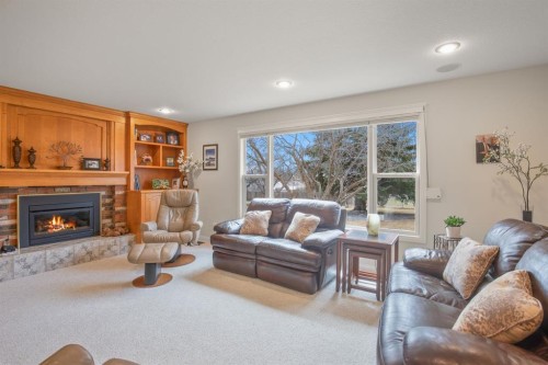 3510 43A Avenue, Red Deer, AB - Indoor Photo Showing Living Room With Fireplace
