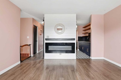 44 Whiteside Crescent, Red Deer, AB - Indoor Photo Showing Living Room With Fireplace