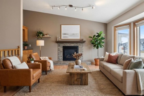 138 Duncan Crescent, Red Deer, AB - Indoor Photo Showing Living Room With Fireplace