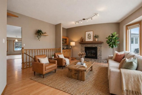 138 Duncan Crescent, Red Deer, AB - Indoor Photo Showing Living Room With Fireplace