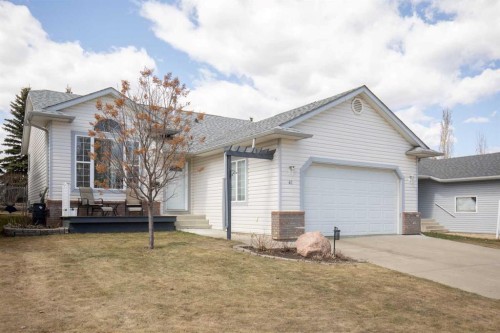 42 Riviera Drive, Lacombe, AB - Outdoor With Facade