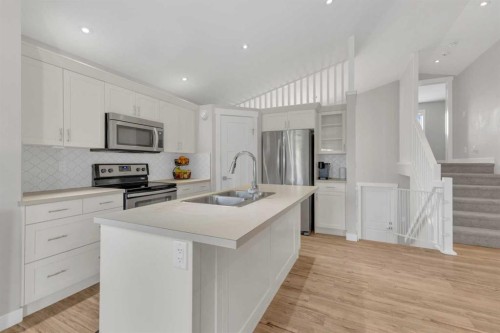 105 Ash Close, Blackfalds, AB - Indoor Photo Showing Kitchen With Double Sink With Upgraded Kitchen