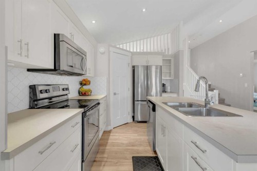 105 Ash Close, Blackfalds, AB - Indoor Photo Showing Kitchen With Double Sink With Upgraded Kitchen