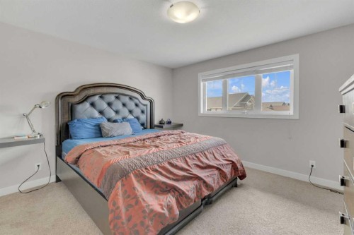 105 Ash Close, Blackfalds, AB - Indoor Photo Showing Bedroom