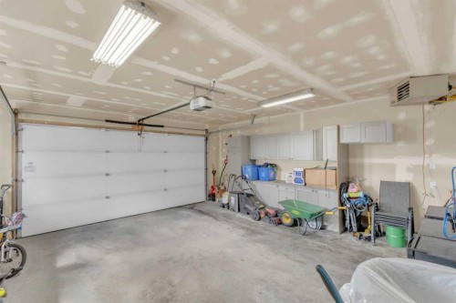 105 Ash Close, Blackfalds, AB - Indoor Photo Showing Garage