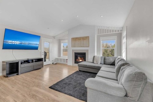 105 Ash Close, Blackfalds, AB - Indoor Photo Showing Living Room With Fireplace