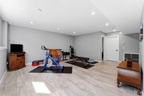 11 Aura Drive, Blackfalds, AB - Indoor Photo Showing Gym Room