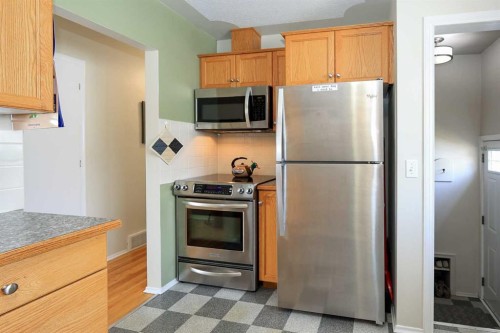 4214 40A Avenue, Red Deer, AB - Indoor Photo Showing Kitchen With Stainless Steel Kitchen