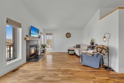 60 Vanson Close, Red Deer, AB - Indoor Photo Showing Living Room With Fireplace