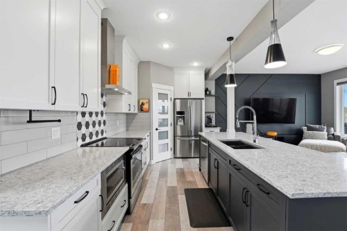 4625 48 Street, Sylvan Lake, AB - Indoor Photo Showing Kitchen With Stainless Steel Kitchen With Upgraded Kitchen
