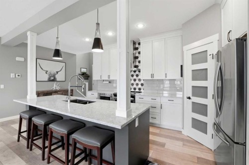4625 48 Street, Sylvan Lake, AB - Indoor Photo Showing Kitchen With Stainless Steel Kitchen With Double Sink With Upgraded Kitchen
