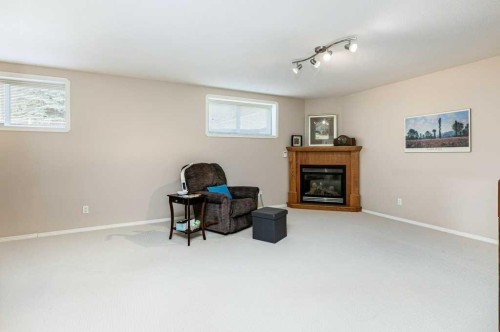 75 Langford Crescent, Red Deer, AB - Indoor With Fireplace