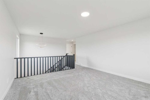 286 Dawson Wharf Rise, Chestermere, AB - Indoor Photo Showing Other Room