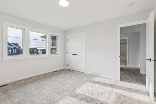 286 Dawson Wharf Rise, Chestermere, AB - Indoor Photo Showing Other Room