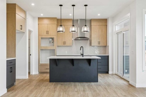 286 Dawson Wharf Rise, Chestermere, AB - Indoor Photo Showing Kitchen With Upgraded Kitchen