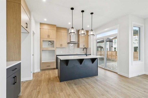 286 Dawson Wharf Rise, Chestermere, AB - Indoor Photo Showing Kitchen With Upgraded Kitchen