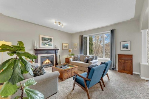 190 Asmundsen Avenue, Red Deer, AB - Indoor Photo Showing Living Room With Fireplace