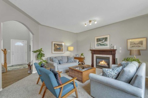 190 Asmundsen Avenue, Red Deer, AB - Indoor Photo Showing Living Room With Fireplace