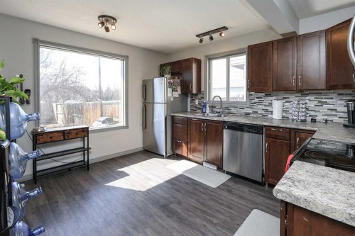 76 Good Crescent, Red Deer, AB - Indoor Photo Showing Kitchen With Double Sink