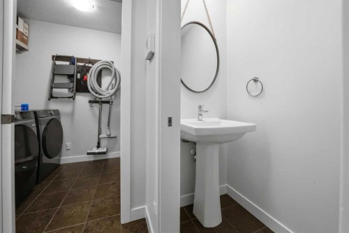 113 Coachman Way, Blackfalds, AB - Indoor Photo Showing Laundry Room