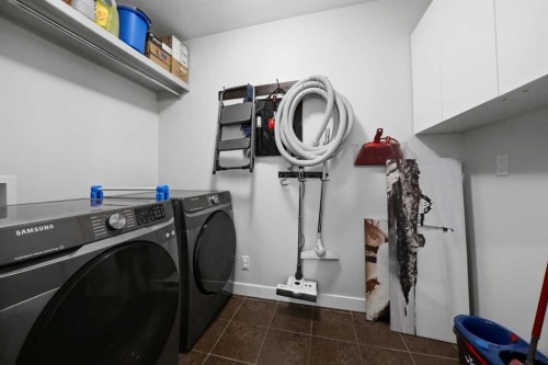 113 Coachman Way, Blackfalds, AB - Indoor Photo Showing Laundry Room