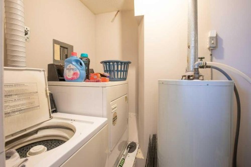 45 Hangingstone Drive, Lacombe, AB - Indoor Photo Showing Laundry Room