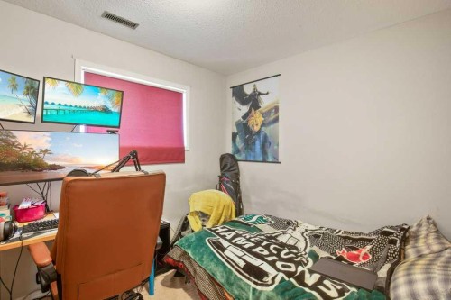 45 Hangingstone Drive, Lacombe, AB - Indoor Photo Showing Bedroom