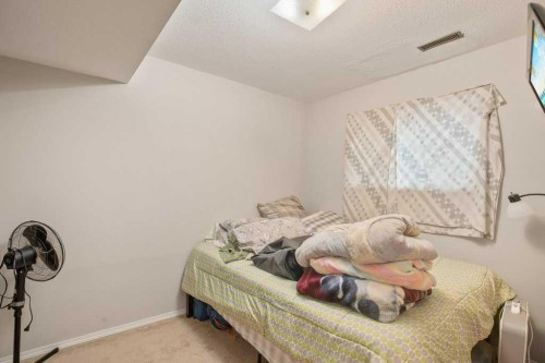45 Hangingstone Drive, Lacombe, AB - Indoor Photo Showing Bedroom