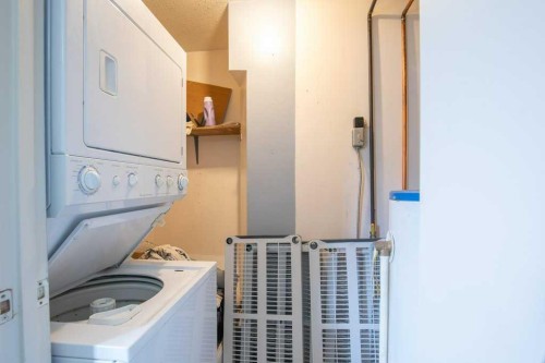 45 Hangingstone Drive, Lacombe, AB - Indoor Photo Showing Laundry Room