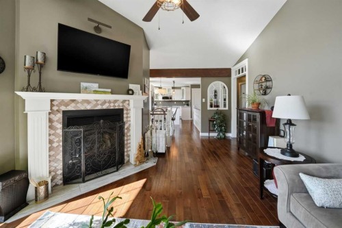 6 Sydney Close, Red Deer, AB - Indoor Photo Showing Living Room With Fireplace