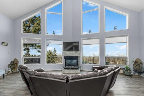 19 Lakeview Drive, Rochon Sands, AB - Indoor Photo Showing Living Room With Fireplace