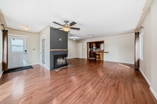 5309 42A Avenue, Red Deer, AB - Indoor Photo Showing Living Room With Fireplace