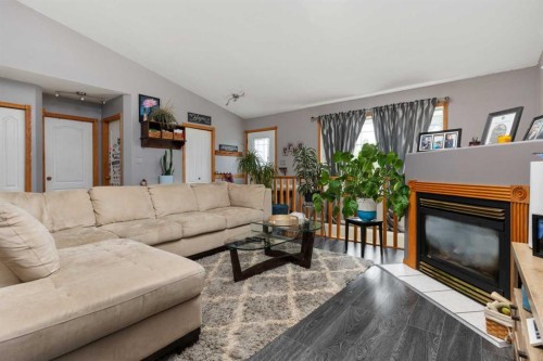 6122 32 Avenue, Camrose, AB - Indoor Photo Showing Living Room With Fireplace