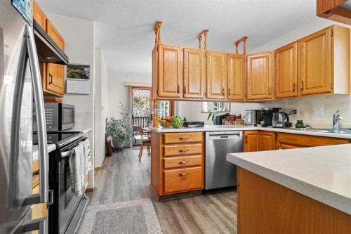 27-2821 Botterill Crescent, Red Deer, AB - Indoor Photo Showing Kitchen With Double Sink