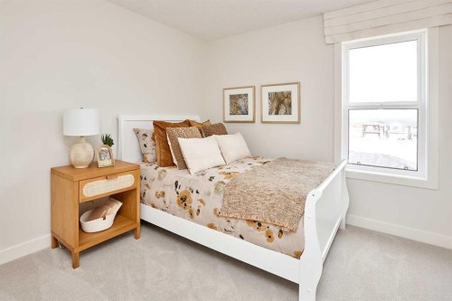 76 Emberside Grove, Cochrane, AB - Indoor Photo Showing Bedroom