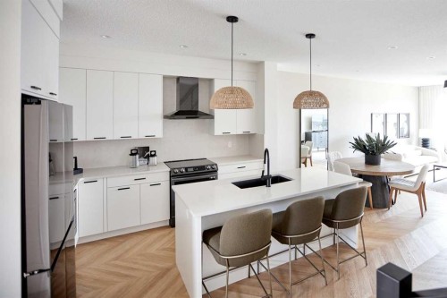 76 Emberside Grove, Cochrane, AB - Indoor Photo Showing Kitchen With Upgraded Kitchen