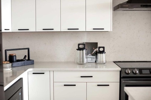 76 Emberside Grove, Cochrane, AB - Indoor Photo Showing Kitchen