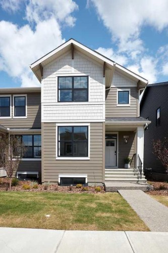 76 Emberside Grove, Cochrane, AB - Outdoor With Facade