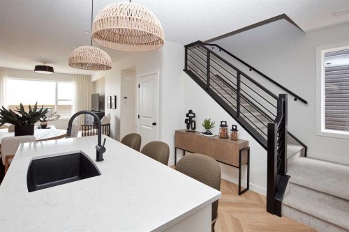 76 Emberside Grove, Cochrane, AB - Indoor Photo Showing Kitchen With Double Sink