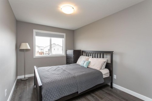 67 Thomlison Avenue, Red Deer, AB - Indoor Photo Showing Bedroom