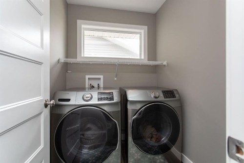67 Thomlison Avenue, Red Deer, AB - Indoor Photo Showing Laundry Room