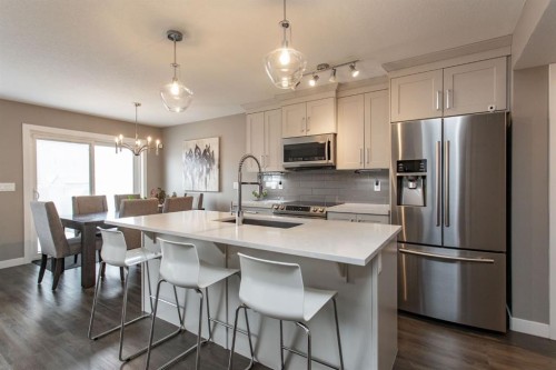 67 Thomlison Avenue, Red Deer, AB - Indoor Photo Showing Kitchen With Stainless Steel Kitchen With Double Sink With Upgraded Kitchen