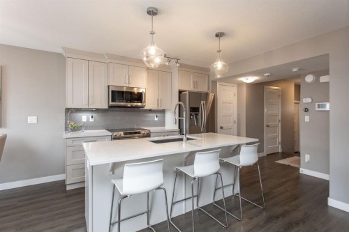 67 Thomlison Avenue, Red Deer, AB - Indoor Photo Showing Kitchen With Stainless Steel Kitchen With Upgraded Kitchen