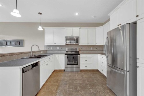 18 Shaw Close, Red Deer, AB - Indoor Photo Showing Kitchen With Stainless Steel Kitchen With Double Sink