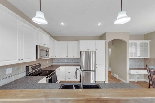 18 Shaw Close, Red Deer, AB - Indoor Photo Showing Kitchen With Stainless Steel Kitchen