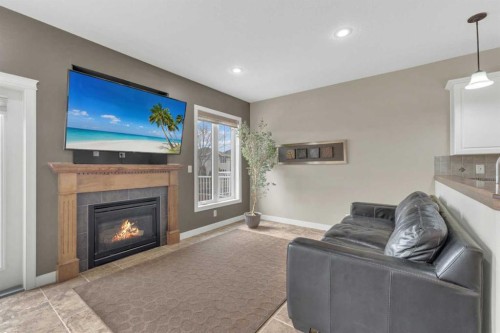 18 Shaw Close, Red Deer, AB - Indoor Photo Showing Living Room With Fireplace