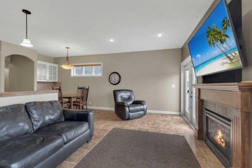18 Shaw Close, Red Deer, AB - Indoor Photo Showing Living Room With Fireplace
