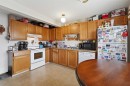 39 Greene Close, Red Deer, AB  - Indoor Photo Showing Kitchen With Double Sink 